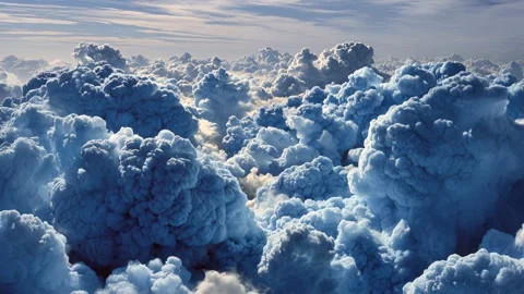 Blue smoke clouds swirl in mesmerizing patterns Video stock 315669404