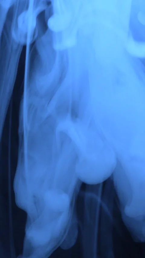 Blue Smoke in Dark Environment Vertical View Stock Footage 335978571