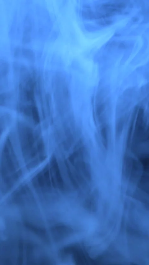 Blue Smoke in Dark Environment Vertical View Stock Footage 335978681