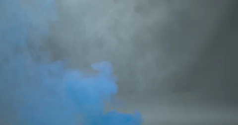 Blue smoke on dark gray background Stock Footage 98213752