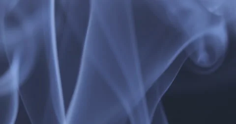Blue smoke floating through space against black background Stock Footage 140213667