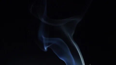 Blue smoke rises on a black background Video stock 105238467