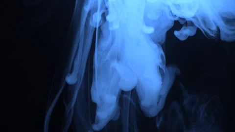 Blue Smoke Swirling in Dark Background Stock Footage 335274147