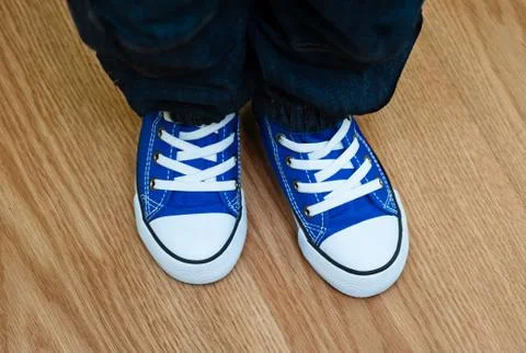 Blue sneakers Stock Photos