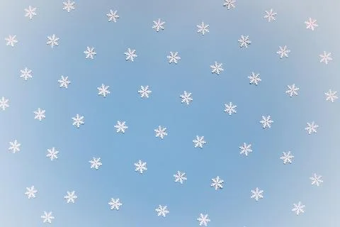 Blue snowflake background with copy space for winter or holiday backgrounds Stock Photos