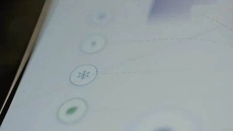 Blue snowflake button on connected interface Stock Footage 345490050