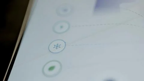Blue snowflake button on connected interface Stock Photos