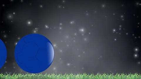 Blue Soccer Balls Bouncing on Grass Under Glowing Night Sky 動画素材 345118050