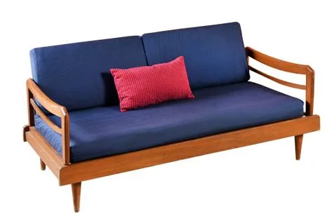 Blue sofa with red pillar Foto stock