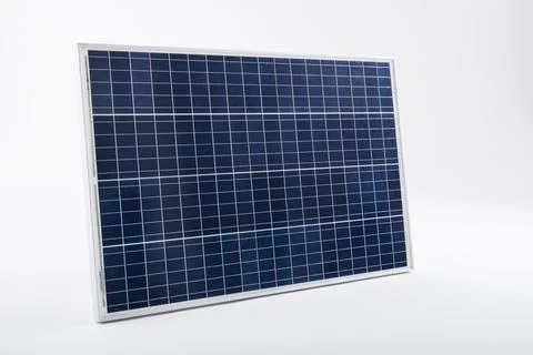 Blue solar panel with grid patterns isolated against white background, copy Stock Photos