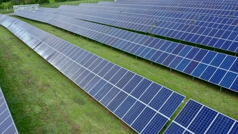 Blue solar panels close up. The glare of the sun on the surface of the panels Stock Footage 156086402