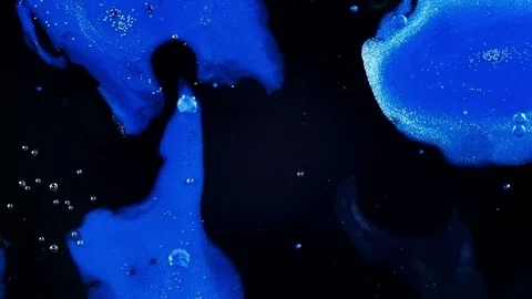 Blue sparkle and flow on black and purple empty void 1 vibrant bright paint and Stock Footage 81598858