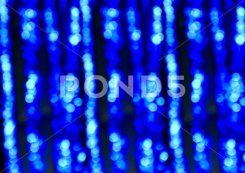 Blue sparkling lights Stock Photos