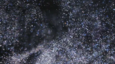 The blue sparkling particles falling in the air. slow motion Stock Footage 160069161