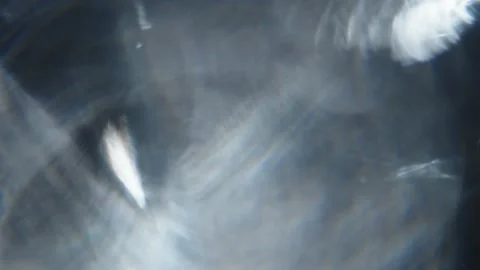 Blue Spectrum Bokeh Crystals in Dynamic Motion Stock Footage 238983549