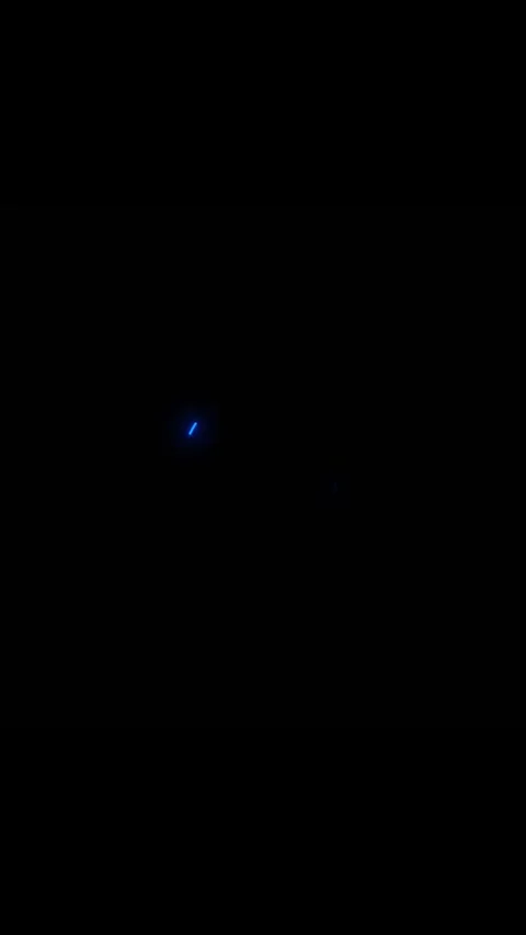 Blue spinner progress visual glowing partial circle, dark empty frame, and minim Stock Footage 340568922