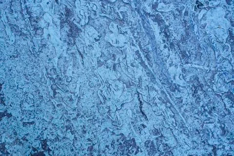 Blue splashed dry paint on the road texture. Stock Photos