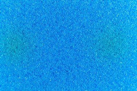 Blue sponge made of microfiber material. Texture, background. In Increase Stock Photos