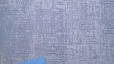 A Blue Sponge Sitting on a Textured Background, Reminding Us of Cleanliness and Stockbeeldmateriaal 291422438