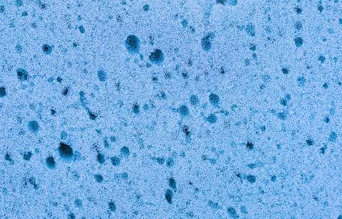 Blue sponge texture over isolated on white background Stock Photos