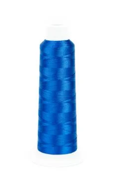 Blue spool of thread on white background Stock Photos