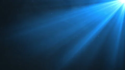 Blue spotlight shining through smoke and particles. 動画素材 152906361