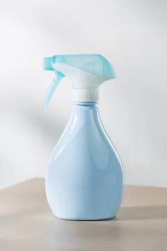 The blue spray bottle Stock Photos