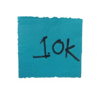 Blue square paper note with handwritten 10k text isolated on white background Stock Photos