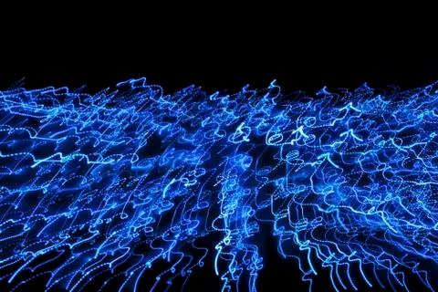 Blue squiggly light pattern Foto stock