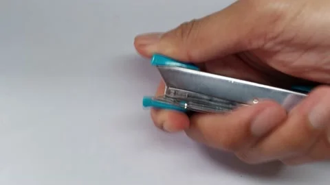 A blue stapler with staples Stock Footage 232832546