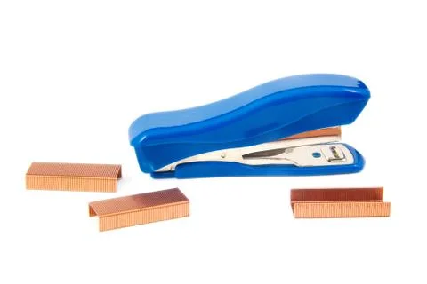 Blue stapler with staples on a white background Stock Photos