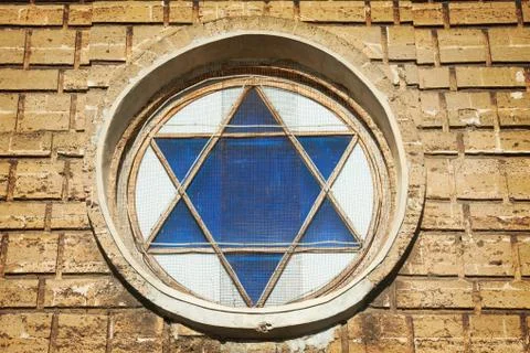 Blue star of David in the window Foto stock