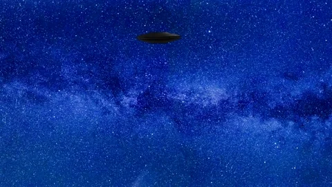Blue starry sky with milky way - flying ufo - universe background Stock Footage 147454415