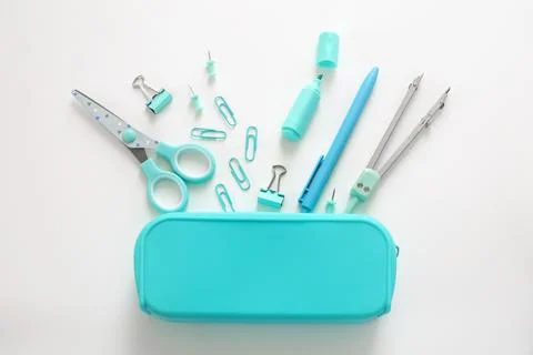 Blue stationery items on the white background. Creative, colorful background Stock Photos