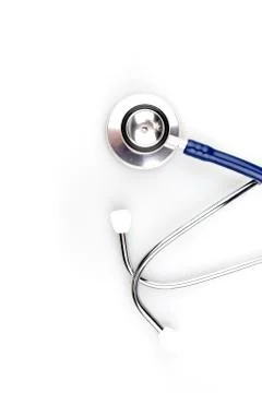 Blue stethoscope with shadow isolated on white background - Image Stock Photos