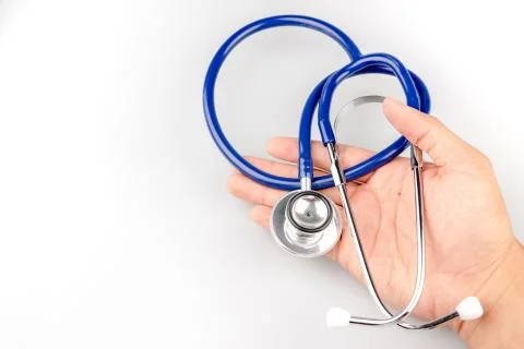 Blue stethoscope with shadow isolated on white background - Image Stock Photos