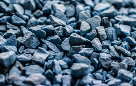 Blue stone pebbles as abstract background texture, landscape architecture bac Stock Photos
