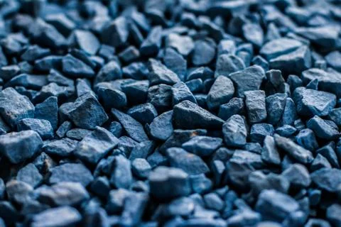 Blue stone pebbles as abstract background texture, landscape architecture bac Stock Photos