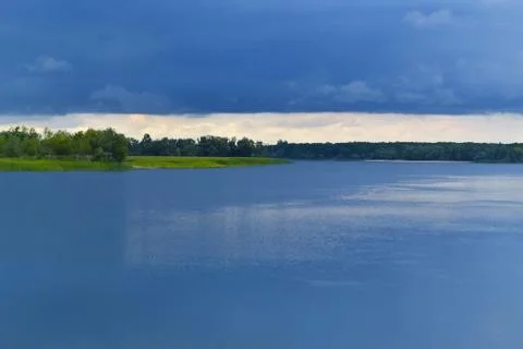 Blue storm clouds over the river 스톡 사진