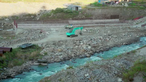Blue stream next to construction site, Lamjung, Nepal Stock Footage 139689666