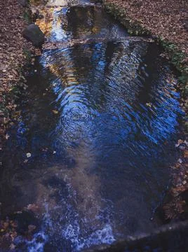 A blue stream of water Stock Photos