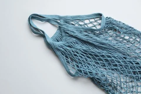 Blue string bag on light grey background, top view Stock Photos