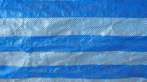 Blue striped crease construction plastic cover Stock Footage 80942905