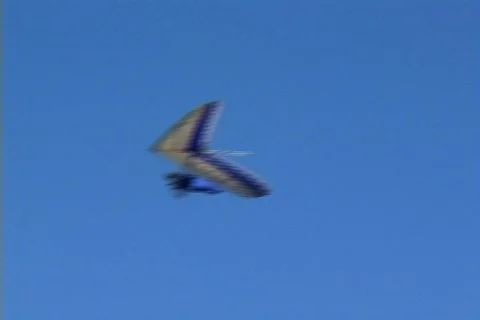 Blue Striped Hang Glider Does a U-turn Stock Footage 141435