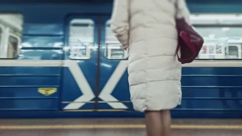 Blue subway train arrives and stops at metro station platform. Passengers Stockbeeldmateriaal 315283107