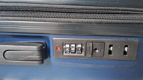 Blue suitcase combination lock with numbers set for travel security 스톡 사진