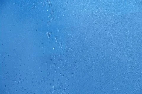 Blue summer raindrops falling Stock Photos