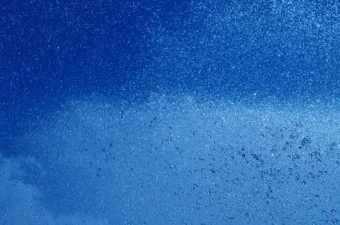 Blue summer raindrops falling Stock Photos