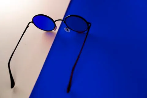 Blue sunglasses Stock Photos