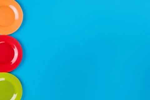Blue surface with colored plates Foto stock